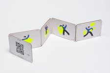 Das Falt-Buch zeigt verschiedene Symbol-Bilder.
 Foto: Bauer_Karl