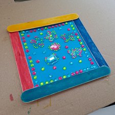 Zum Kreativ-Angebot gehörten bunte Holzrahmen-Bilder.